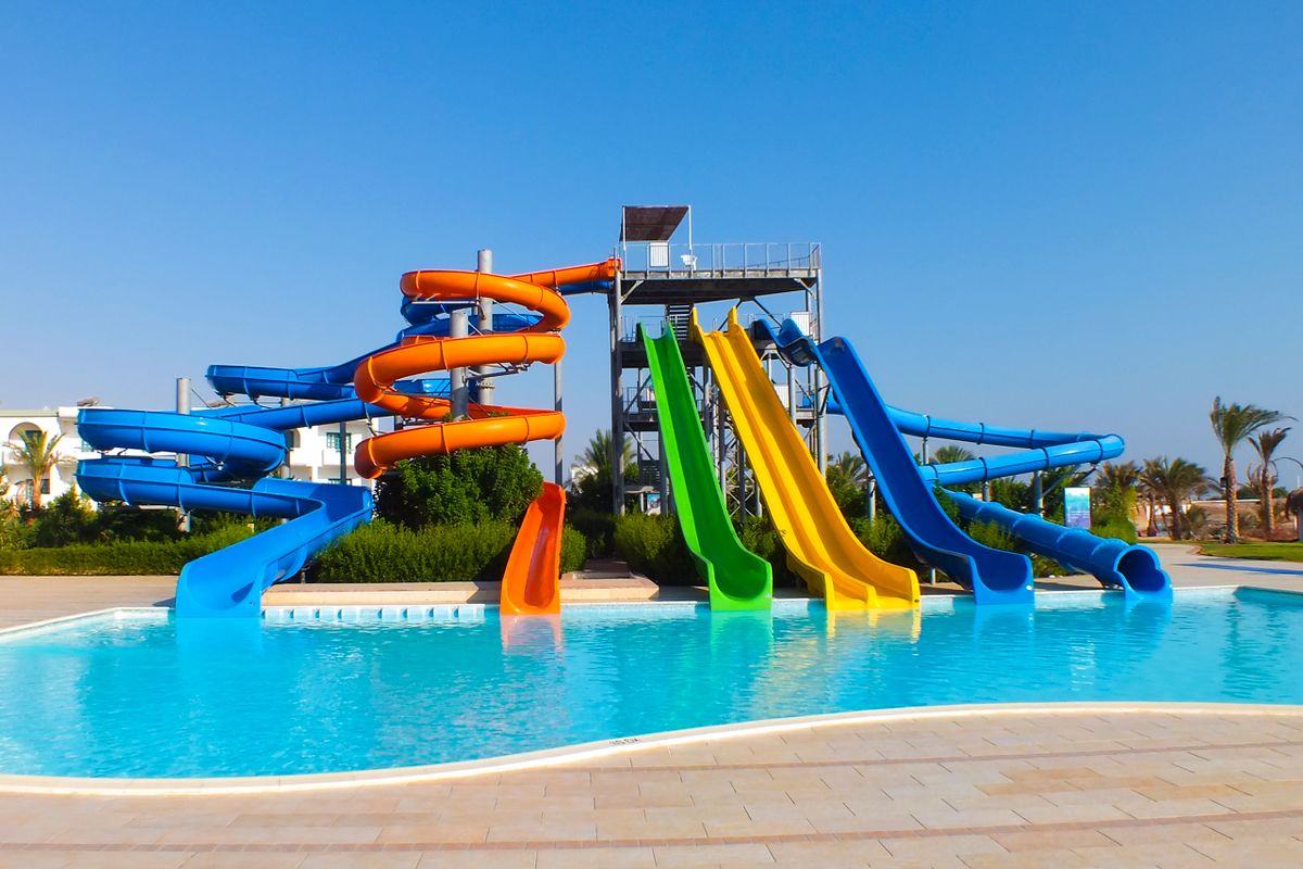 Water park with colorful slides fertőzés, strand, csúszda